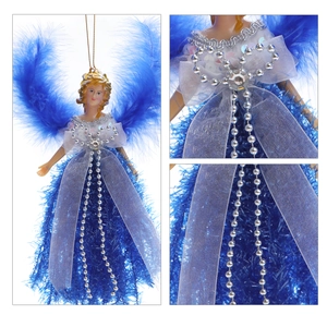 Detail of blue angel doll with feather wings and glitter bow for Christmas tree decor