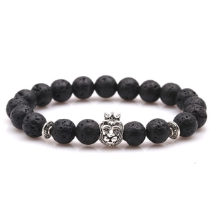 Men's black lava rock beaded bracelet with silver lion head and crown charm