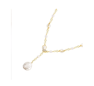 Detail of baroque pearl necklace with heart-shaped zircon pendant on gold chain