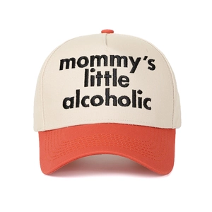 Close-up of Mommy's Little Alcoholic black embroidery on white and orange baseball cap