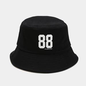 Detail shot of the white 88 number print and fine stitching on a black cotton bucket hat