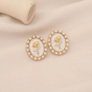 French vintage oval pearl earrings with gold 3D rose and white marble center