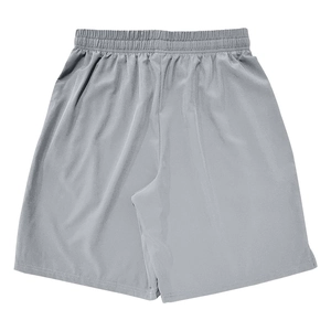 Detail view of men's athletic shorts featuring elastic waistband and quick-dry fabric texture