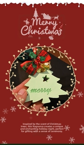 Detail of green Christmas tree scented plaster ornament with merry text and bow