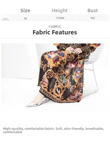 Detailed view of baroque print dress fabric with floral patterns on a seated model