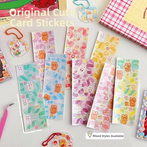 Set of 8 cute laser glitter stickers featuring cartoon bears and colorful ribbons