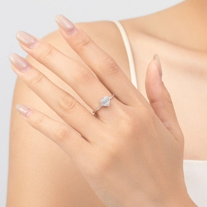 Elegant S925 sterling silver heart ring with pave diamonds on model's finger