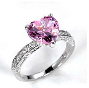 Macro shot of S925 sterling silver ring with heart shaped pink cubic zirconia stone
