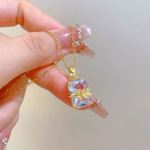 Luxurious gold titanium steel necklace with leaf design and rectangular zircon pendant