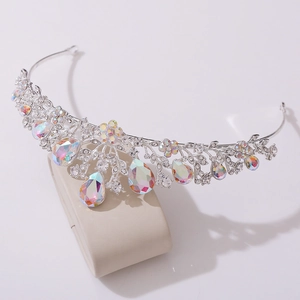 Close-up of silver leaf tiara with iridescent AB rhinestones and crystal flower details