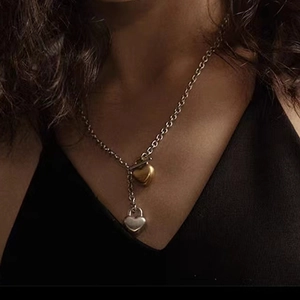 Vintage heart OT buckle necklace with gold and silver heart pendants in chunky chain link