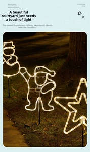 Solar Christmas garden stakes featuring snowman, Santa, and star shapes in warm LED light