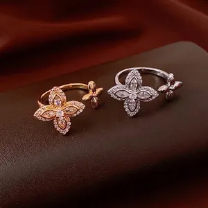 French luxury flower open ring with sparkling zircon in gold and silver finish