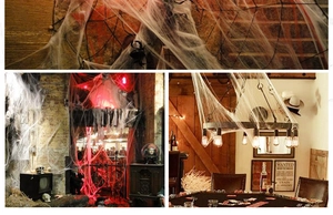 Halloween spider webs in white, red and black shown on walls and fireplaces