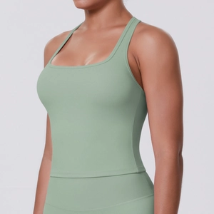Detail of the square neckline and racerback design on sage green seamless yoga tank top