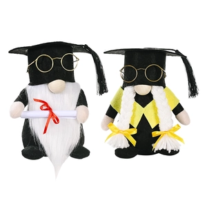 Pair of graduation gnomes with black academic caps and glasses for festive decor