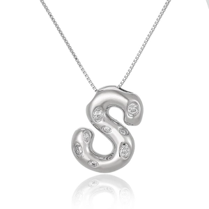 Detailed view of silver letter S pendant with micro-inlaid zircons and venetian chain