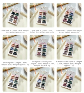 Macro display of assorted mini hair claws in Morandi colors and matte finish textures