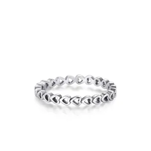 Minimalist S925 sterling silver ring with interlocking hollow heart patterns for women