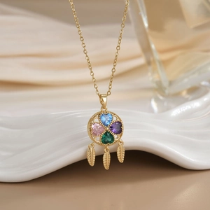 Golden dreamcatcher necklace with four heart zircons and three feather charms