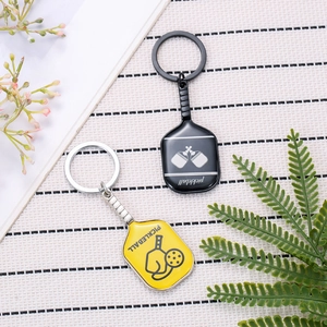 Creative metal pickleball racket keychains with vibrant enamel finish and sporty design
