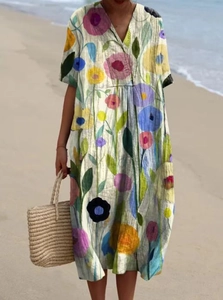 Robe longue d'été à col en V avec imprimé floral coloré pour un look de vacances à la plage