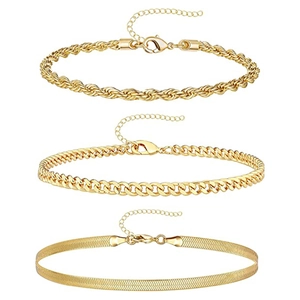 Gouden minimalistische armbandenset met getordeerde touwketting, schakelketting en slangenketting