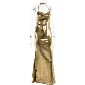 Detail of metallic gold halter neck dress showing the backless cowl neck design