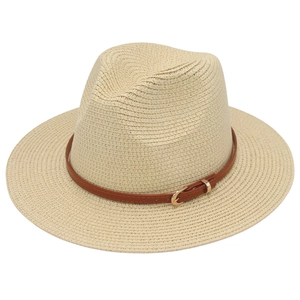 Close-up of beige Panama hat featuring a brown leather belt with a golden buckle