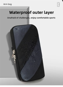 Close-up of water-resistant fabric with water droplets on a black sports arm bag