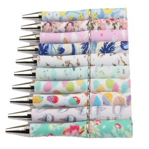Colorful assorted retractable plastic ballpoint pens with diverse floral and fruit prints