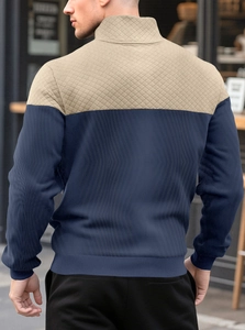 Back view of men's polo jacket featuring dark blue and khaki quilted stitching