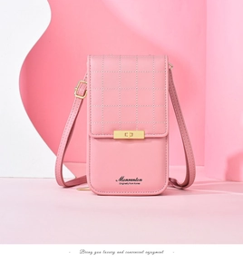 Detail of pink PU leather phone bag with diamond stitching and golden hardware lock