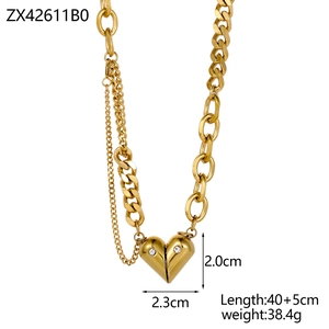 Elegant gold heart pendant necklace with thick chain and sparkling crystal accents