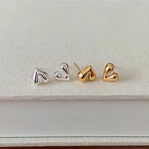 Lava heart earrings in gold and silver finish with mirror polished liquid metal texture