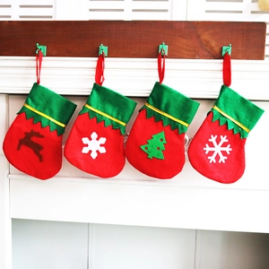 Mini Christmas stocking cutlery holders with snowflake and reindeer felt appliques