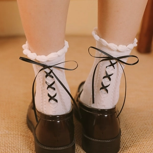 Japanese Lolita white calf socks with black ribbon lace-up bow and heart lace trim