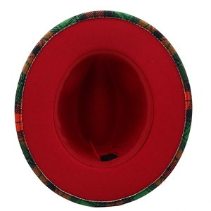 Overhead view of red wool fedora interior featuring green plaid trim and inner lining