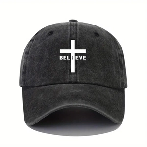 Washed black cotton baseball cap with white cross and BELIEVE text on plain white background