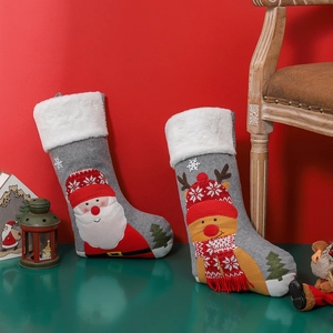 Christmas stockings set with Santa and reindeer patterns on grey felt and faux fur trim