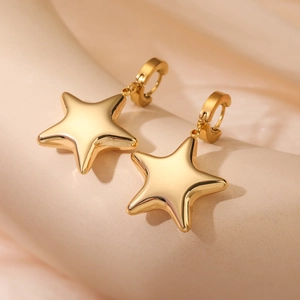 Fashionable golden star dangle earrings in stainless steel for women with minimalist style