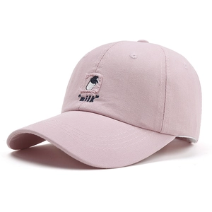 Pink cotton baseball cap with milk bottle embroidery and curved brim on white background