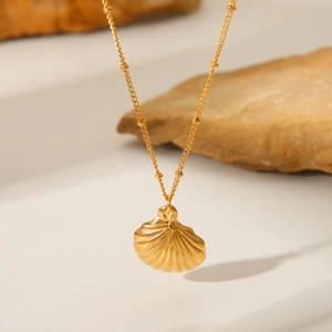 18K gold plated stainless steel necklace featuring a textured seashell pendant for women