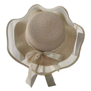 Women's summer straw hat with wide chiffon brim and elegant beige ribbon bow