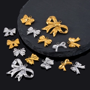 Polished stainless steel bow pendants in gold and silver finish for DIY jewelry making