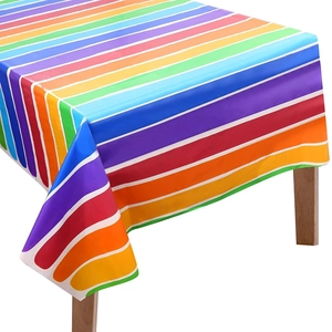 Close-up of colorful rainbow striped disposable plastic tablecloth for birthday parties