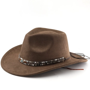 Detail of brown jazz fedora with ethnic woven band and tassel on high-quality felt material