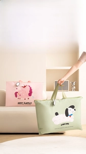 Detail of durable storage bags featuring digital unicorn prints and reinforced handles