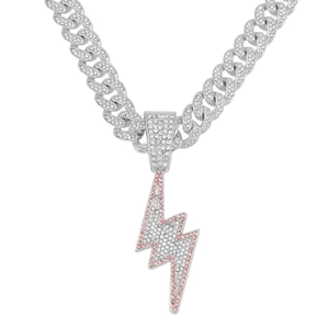 Close-up of hip hop cuban chain with silver and pink crystal lightning bolt pendant
