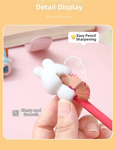 Detail view of rabbit manual pencil sharpener cutting smooth flower-like shavings